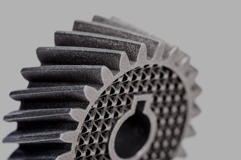 What are the key differences between SLM and DMLS in metal 3D printing